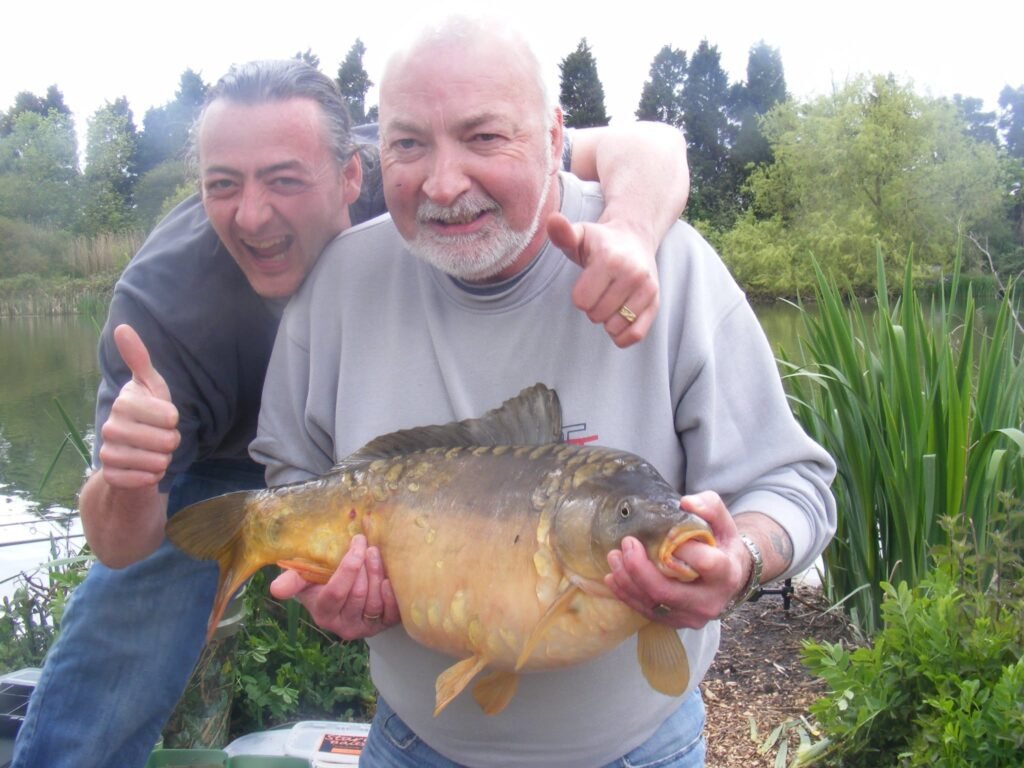 Simon Newcombe and his dad enjoying a day fishing together